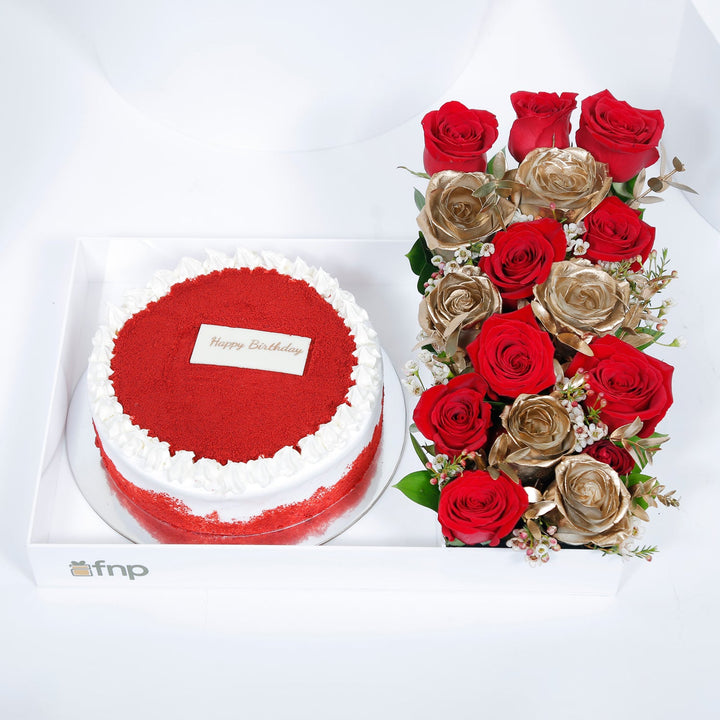سعادة عيد الميلاد: كعكة ريد فيلفيت الفاخرة مع ترتيب زهور أنيق