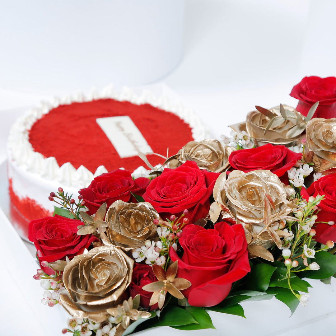 Birthday Bliss: Luxurious Red Velvet Cake with Elegant Floral Arrangement