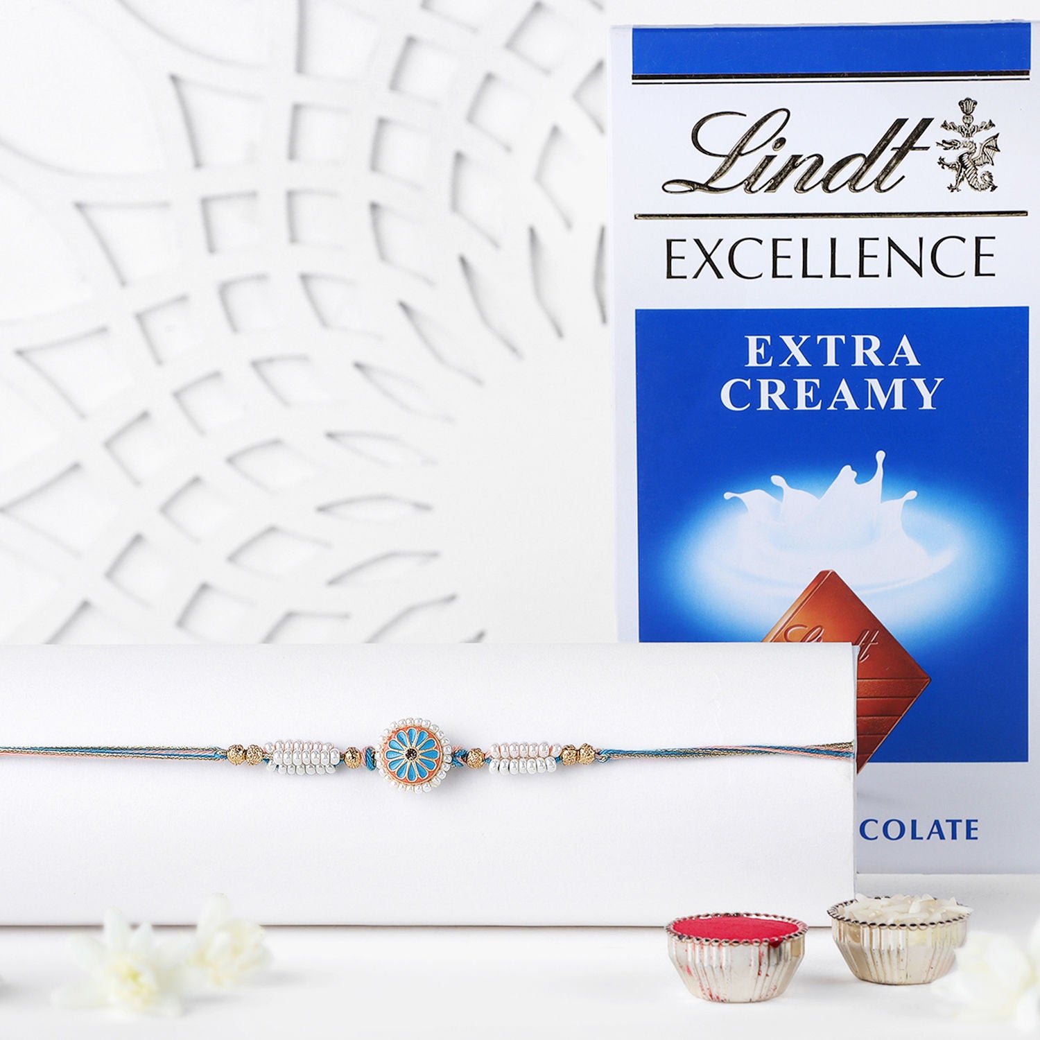 Blue Floral Meenakari Rakhi N Lindt Milk Chocolate