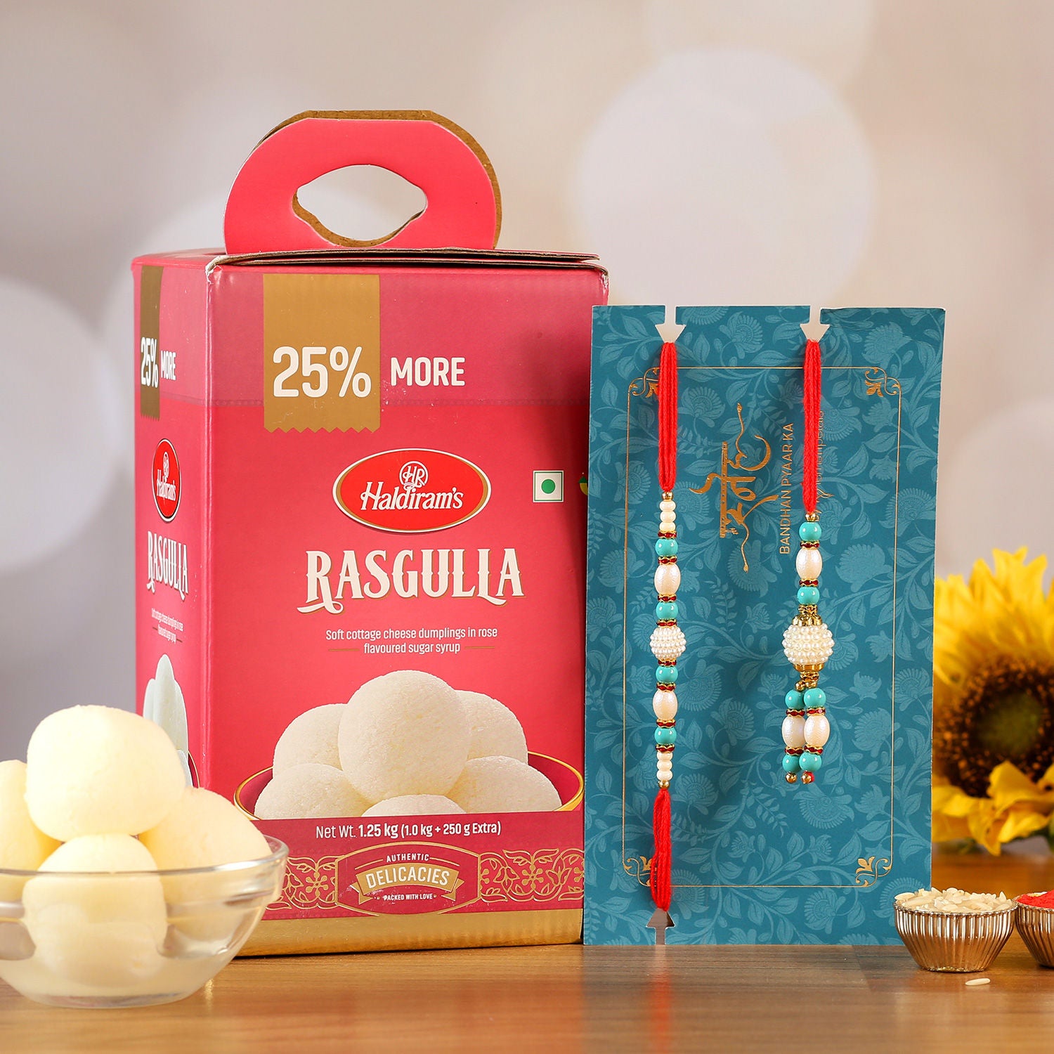 Blue Pearl Lumba Rakhi Set And Rasgulla