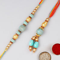 Blue Stone Rakhi Set And Soan Papdi Combo