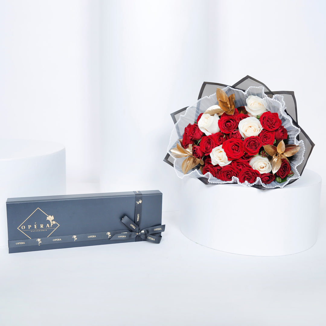 أوبرا باتيسري | صندوق شوكو بايت مع باقة زهور أنيقة