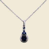 The Sapphire Glow Necklace with Elegant Yellow Rose Box