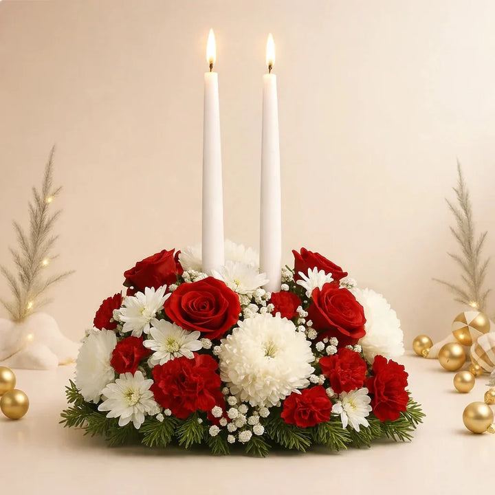 ورد طاولة مع شموع عيد الميلاد