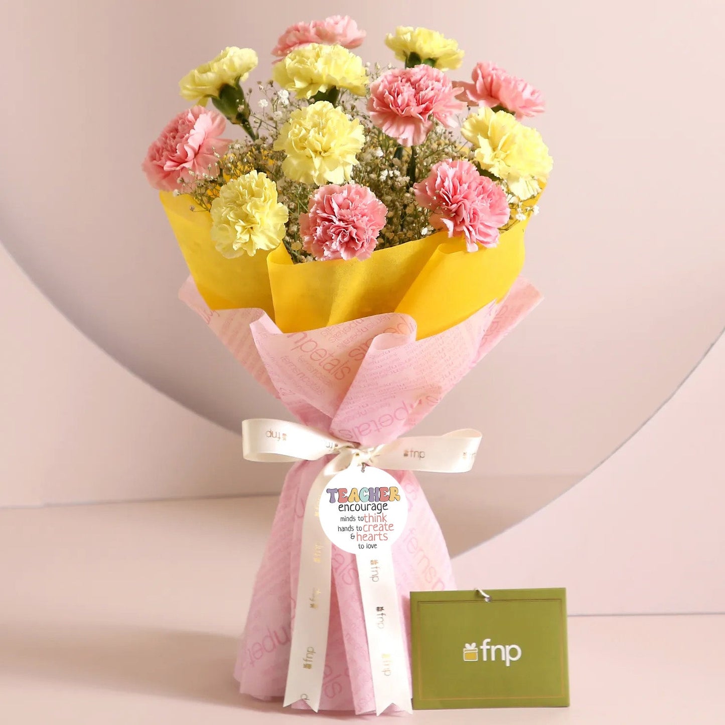 Celestial Moments Carnations Bouquet: A Blissful Symphony of Pink and Yellow
