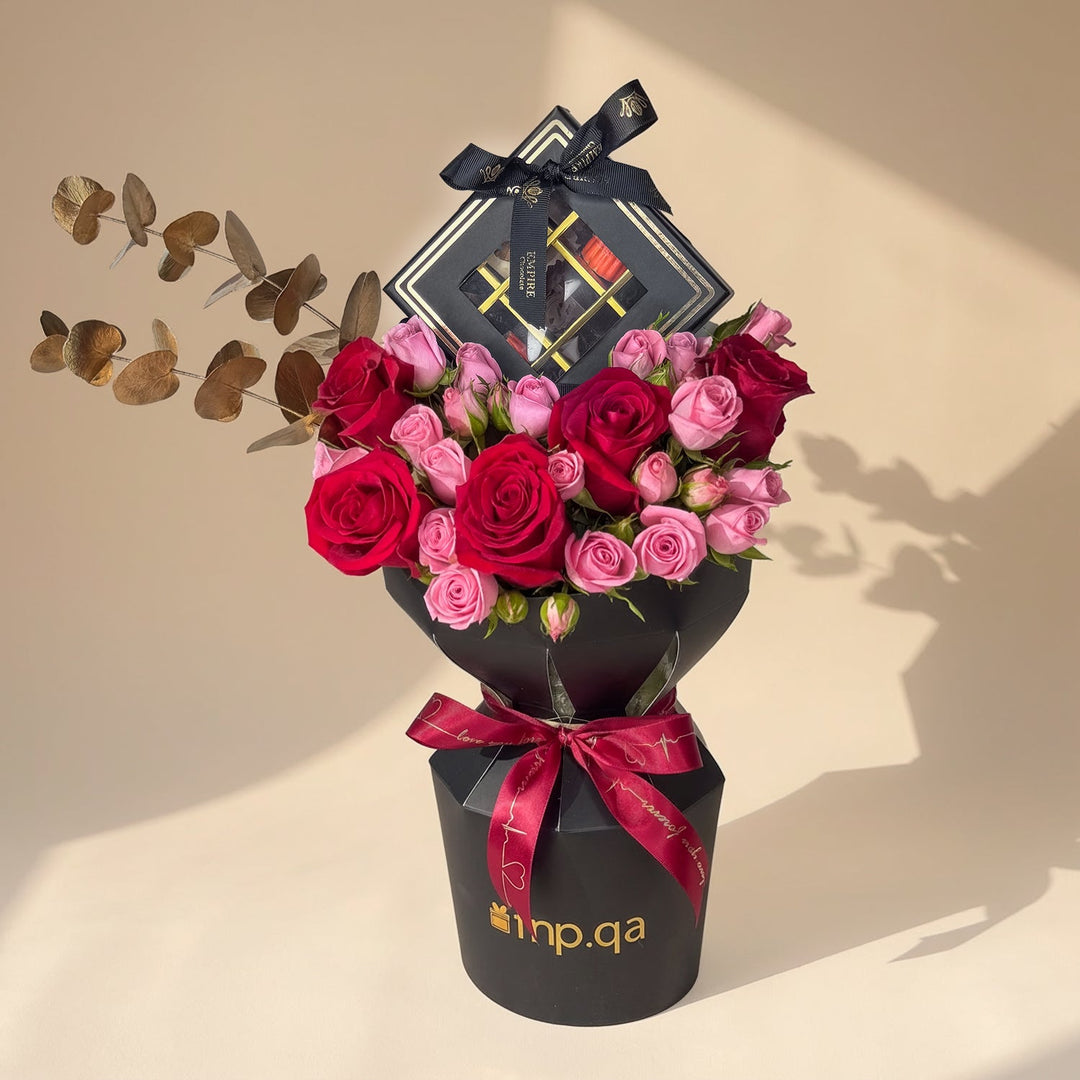 تشكيلة فاخرة من الشوكولاتة والورود لعيد الميلاد