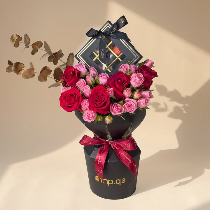 تشكيلة فاخرة من الشوكولاتة والورود لعيد الميلاد