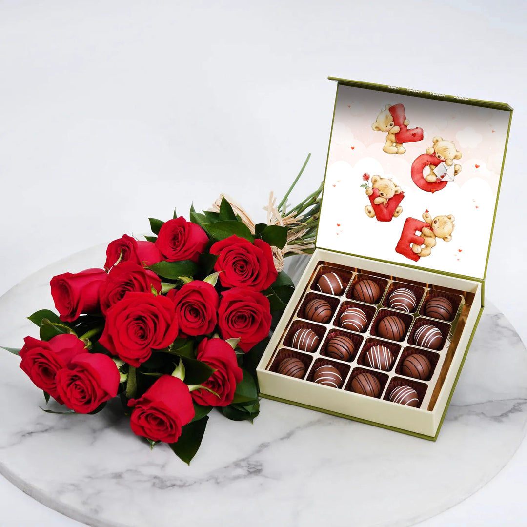 باقة ورود حمراء أنيقة ومجموعة هدايا شوكولاتة بلجيكية فاخرة