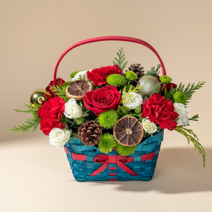 سلة زهور بهجة عيد الميلاد الاحتفالية
