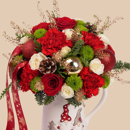 Festive Christmas Floral Arrangement in Decorative Jug