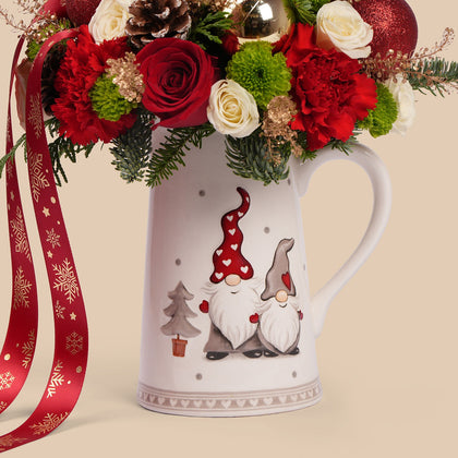 Festive Christmas Floral Arrangement in Decorative Jug