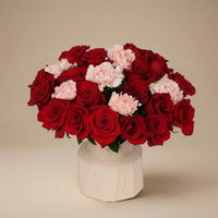 Elegant Romance: Red Roses & Pink Carnations in Designer Vase