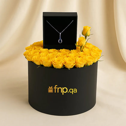 The Sapphire Glow Necklace with Elegant Yellow Rose Box