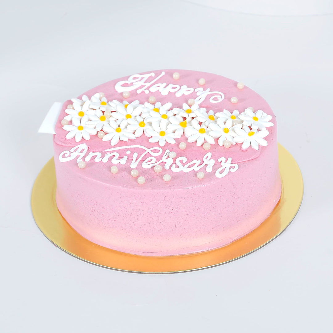 Elegant Pink Chocolate Anniversary Cake with Floral Design
