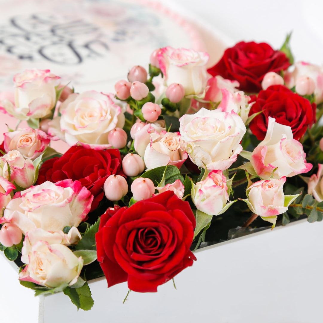 Elegant Pink Eid Mubarak Cake with Floral Arrangement in Acrylic Box