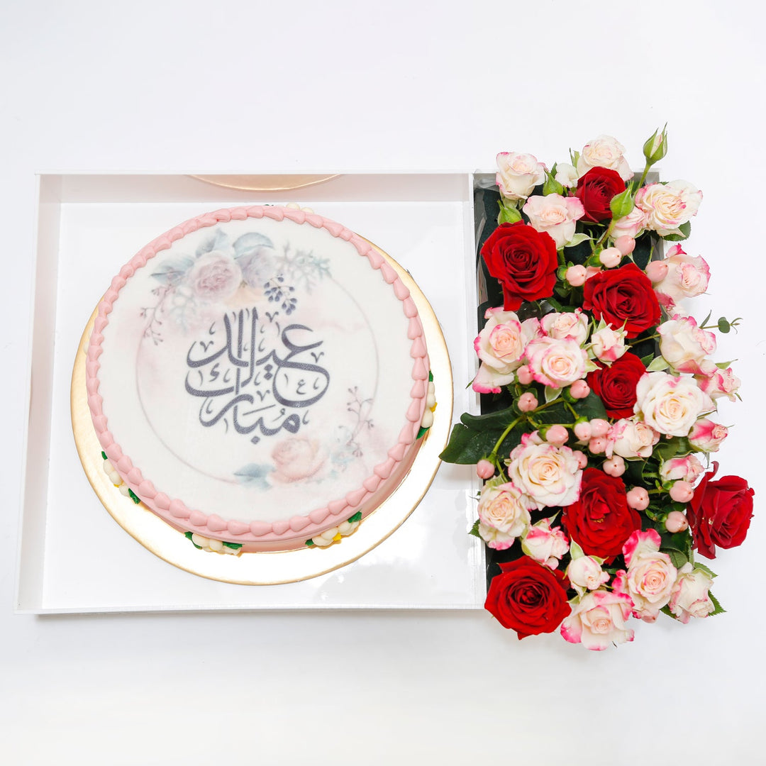 Elegant Pink Eid Mubarak Cake with Floral Arrangement in Acrylic Box