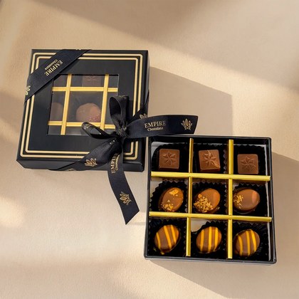 تشكيلة فاخرة من الشوكولاتة والورود لعيد الميلاد