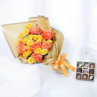 مجموعة هدايا إمباير شوكولاتة | صندوق شوكولاتة ذهبي فاخر مع توليفة متنوعة وباقة زهور نابضة بالحياة