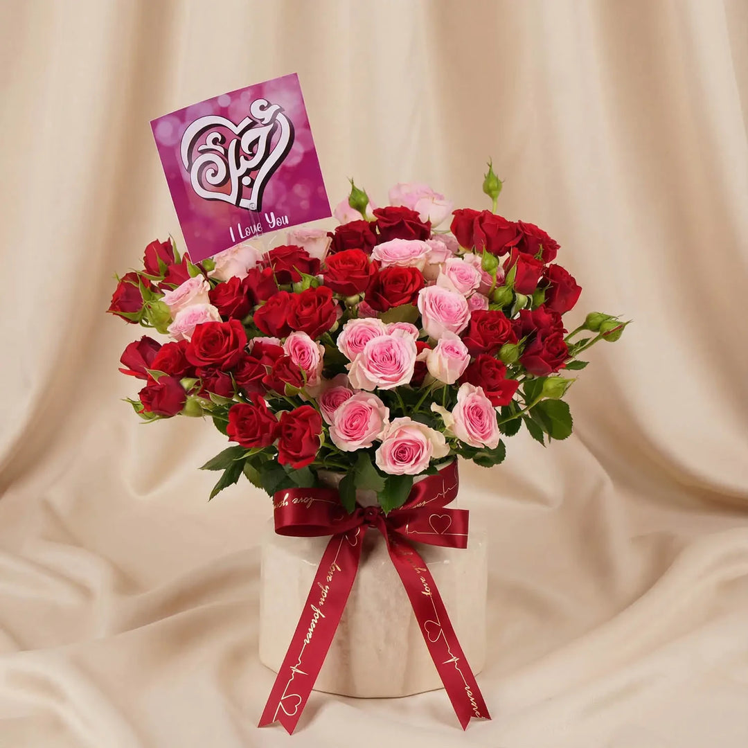 Endless Love Story: Elegant Red and Pink Spray Roses in Designer Vase