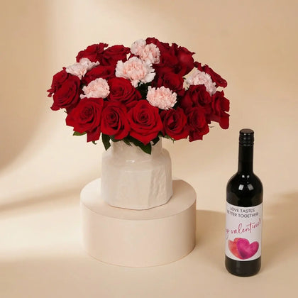 Elegant Romance: Red Roses & Pink Carnations in Designer Vase