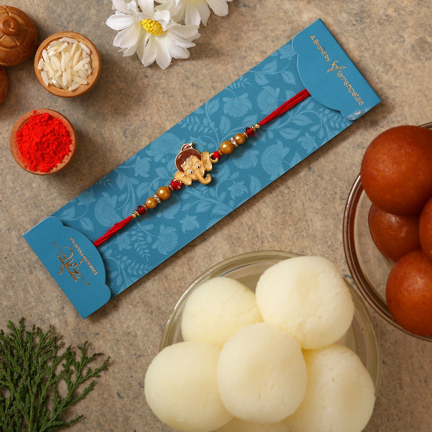 Ganesha Face Kids Rakhi With Gulabjamun And Rasgulla