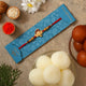 Ganesha Face Kids Rakhi With Gulabjamun And Rasgulla