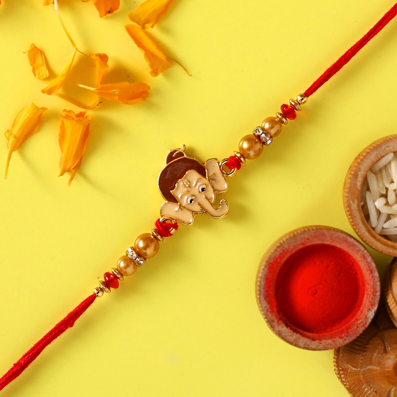 Ganesha Face Kids Rakhi And Cashew With Kaju Katli