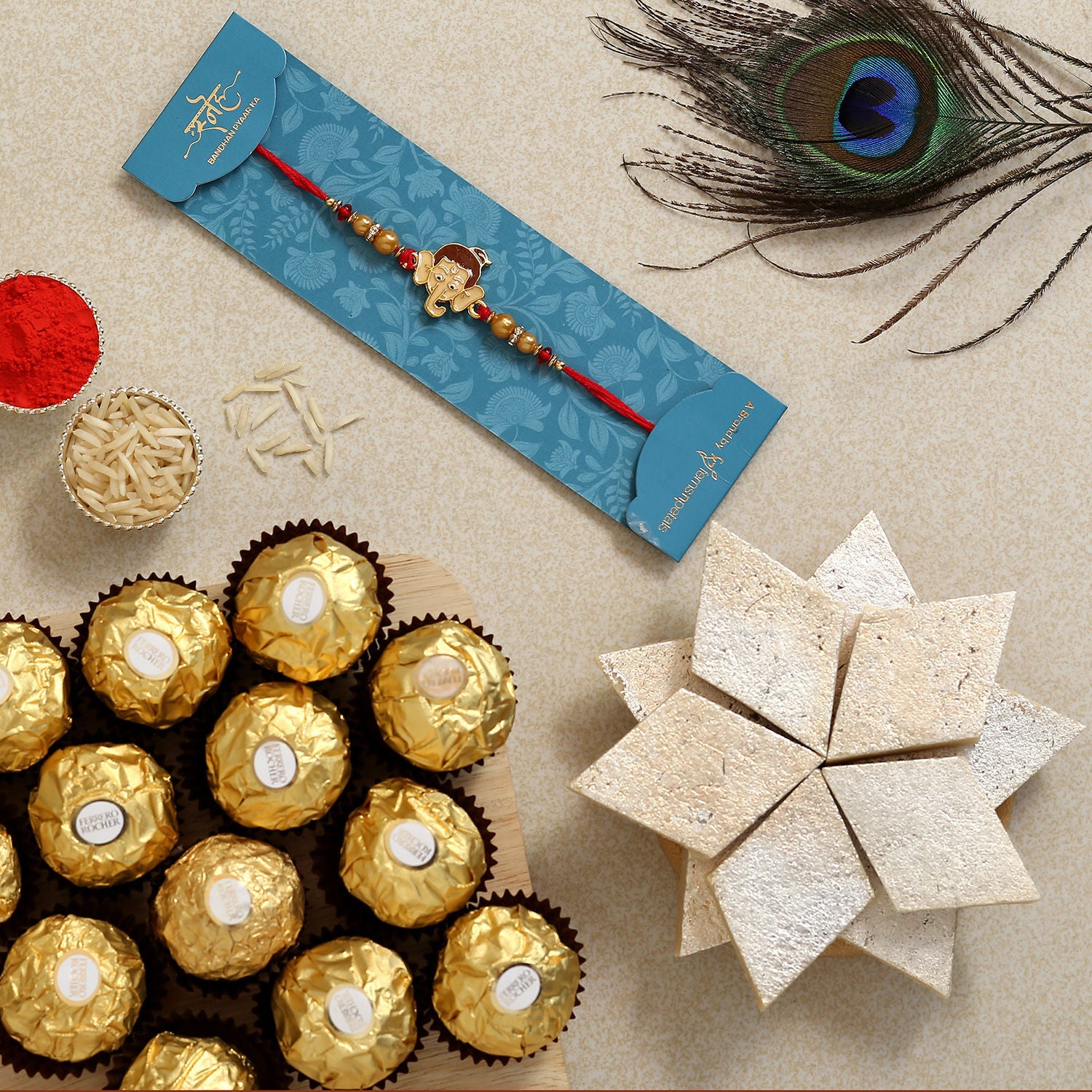 Ganesha Kids Rakhi With Kaju Katli And Ferrero Rocher