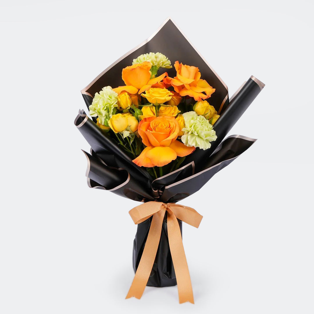 صندوق غوديفا الملكي المصغر مع باقة ورود زاهية