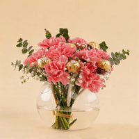 Elegant Pink Carnation Bouquet with Ferrero Rocher in Glass Vase