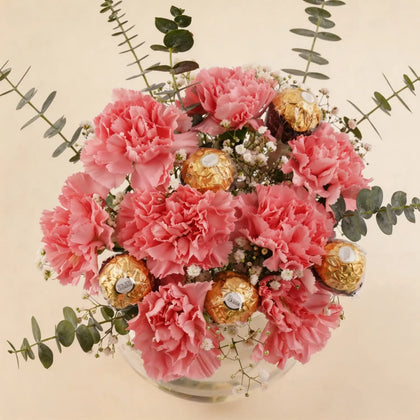 Elegant Pink Carnation Bouquet with Ferrero Rocher in Glass Vase