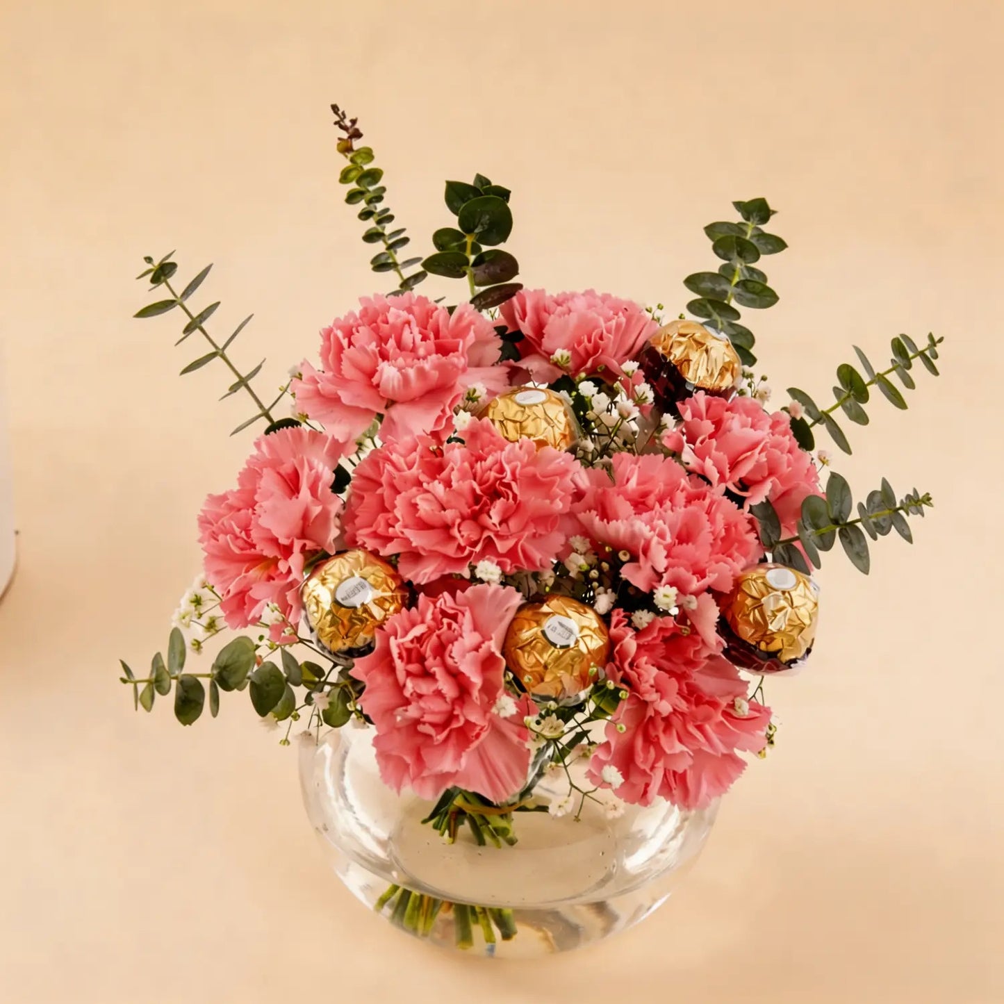 Elegant Pink Carnation Bouquet with Ferrero Rocher in Glass Vase