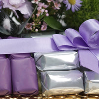 Elegant Golden Tray with Mixed Purple Flowers & Premium Chocolates