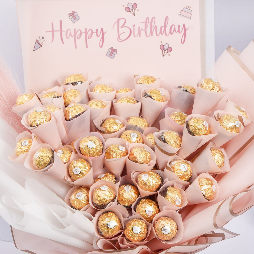 باقة عيد ميلاد فاخرة مع لمسة فيريرو روشيه وبامباس