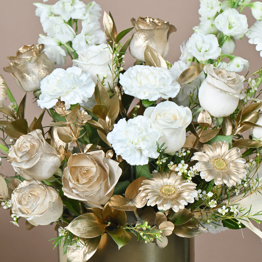 Harmonious Flowers: Elegant White Floral Arrangement in a Gold Round Box