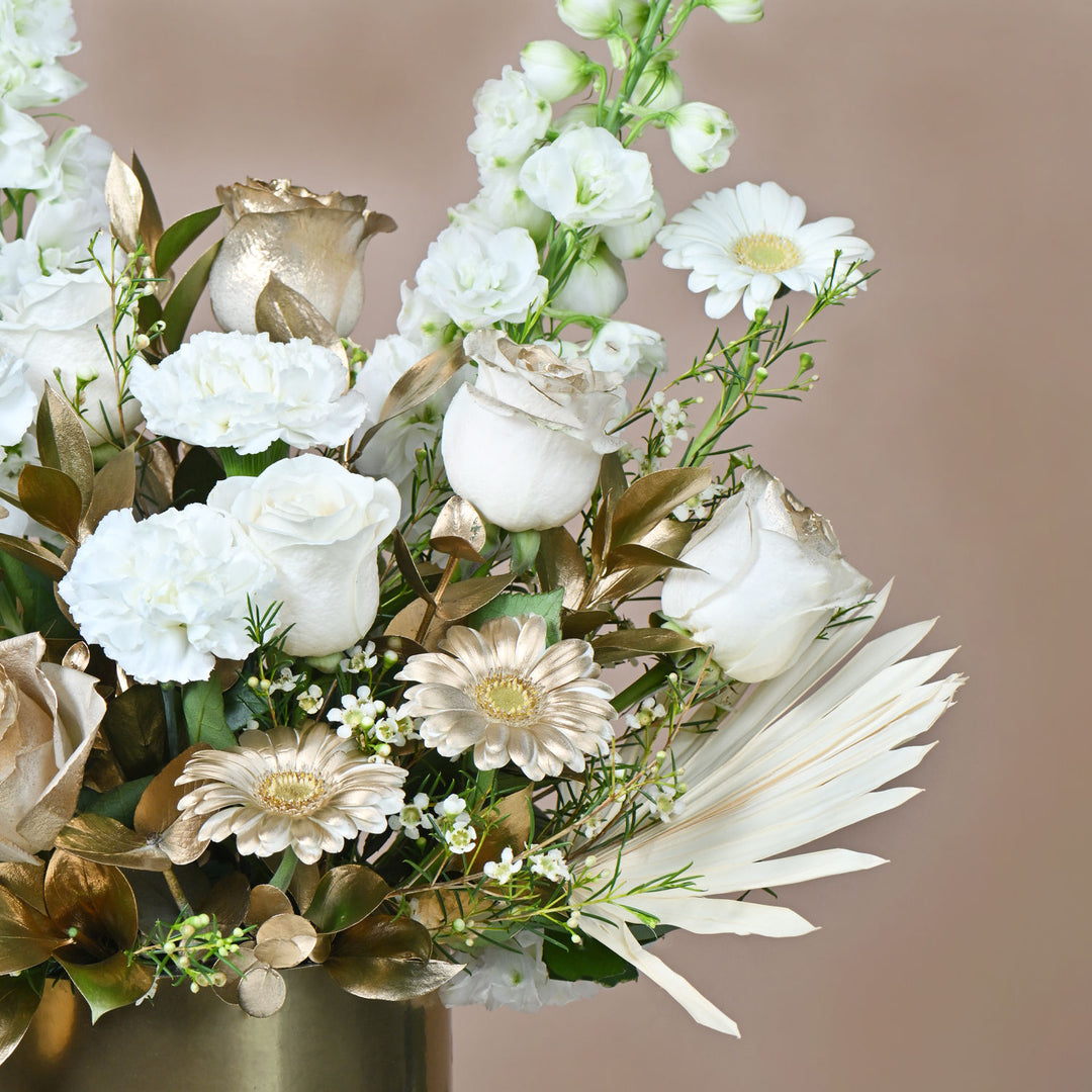 Harmonious Flowers: Elegant White Floral Arrangement in a Gold Round Box