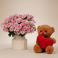 Lavender Dreams: Elegant Rose Bouquet in Ceramic Vase