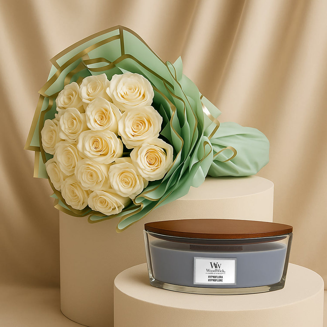 هيبنو فلورا – زهرة السكون: باقة من الورود البيضاء الأنيقة مع شمعة عطرية