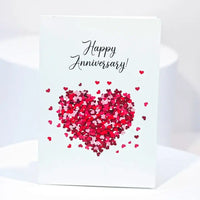 طقم احتفال رومانسي: بالون أحبك، مفاجأة الحفلات وبطاقة الذكرى السنوية