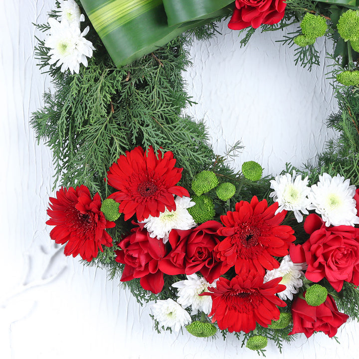 Festive Jolly Christmas Floral Wreath with Roses and Gerberas