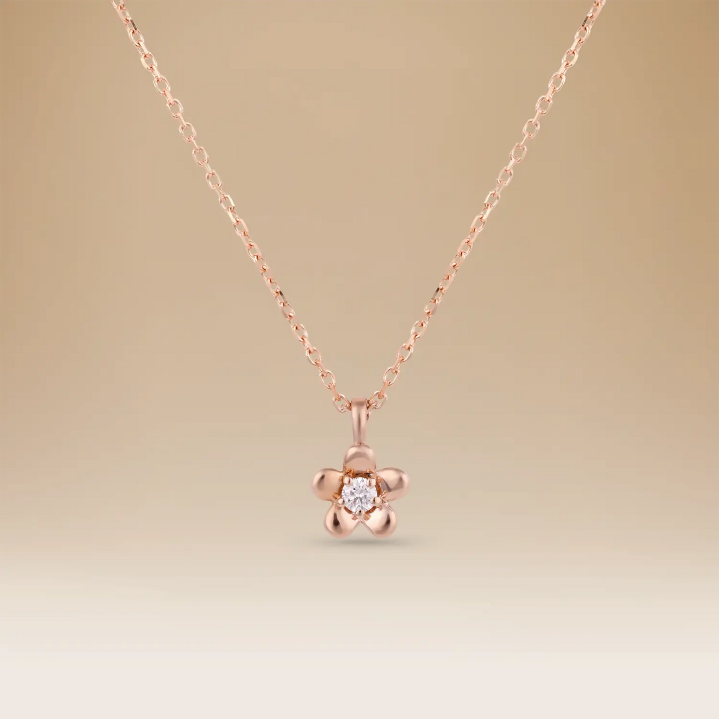 قلادة الفرح الرائعة – أناقة الذهب الوردي عيار 18 والماس