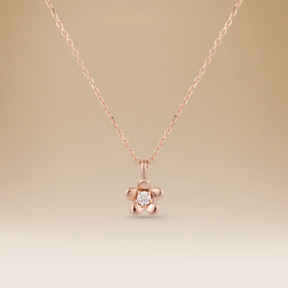 قلادة الفرح الرائعة – أناقة الذهب الوردي عيار 18 والماس