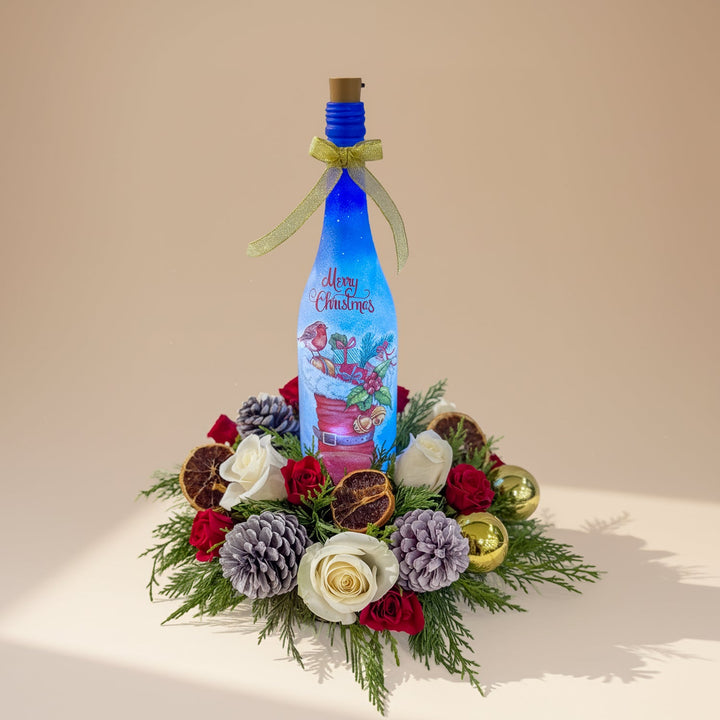 ترتيب زهور عيد الميلاد الاحتفالي بزجاجة مضيئة