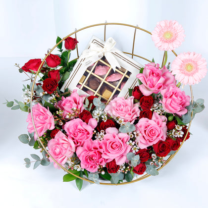 Elegant Metal Stand Arrangement with Mixed Flowers and Gourmet Chocolates