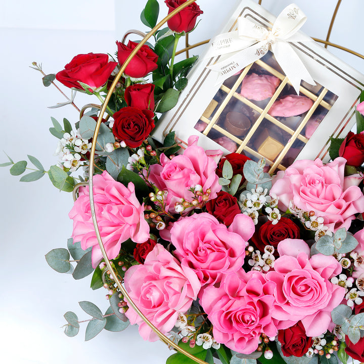 Elegant Metal Stand Arrangement with Mixed Flowers and Gourmet Chocolates