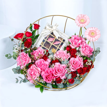 Elegant Metal Stand Arrangement with Mixed Flowers and Gourmet Chocolates