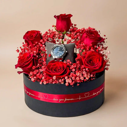 أناقة خالدة: مجموعة هدايا ورود حمراء وساعة تيتان زرقاء
