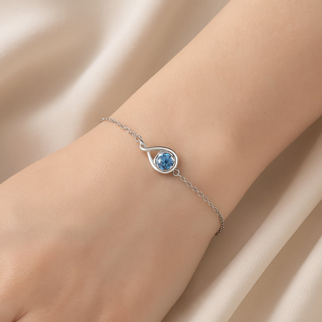 سوار أوقيانوس جلو الفضي بحجر كريم أزرق