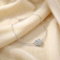 Elegant Omnia Heart Bracelet in 18K White Gold with Diamond Accent