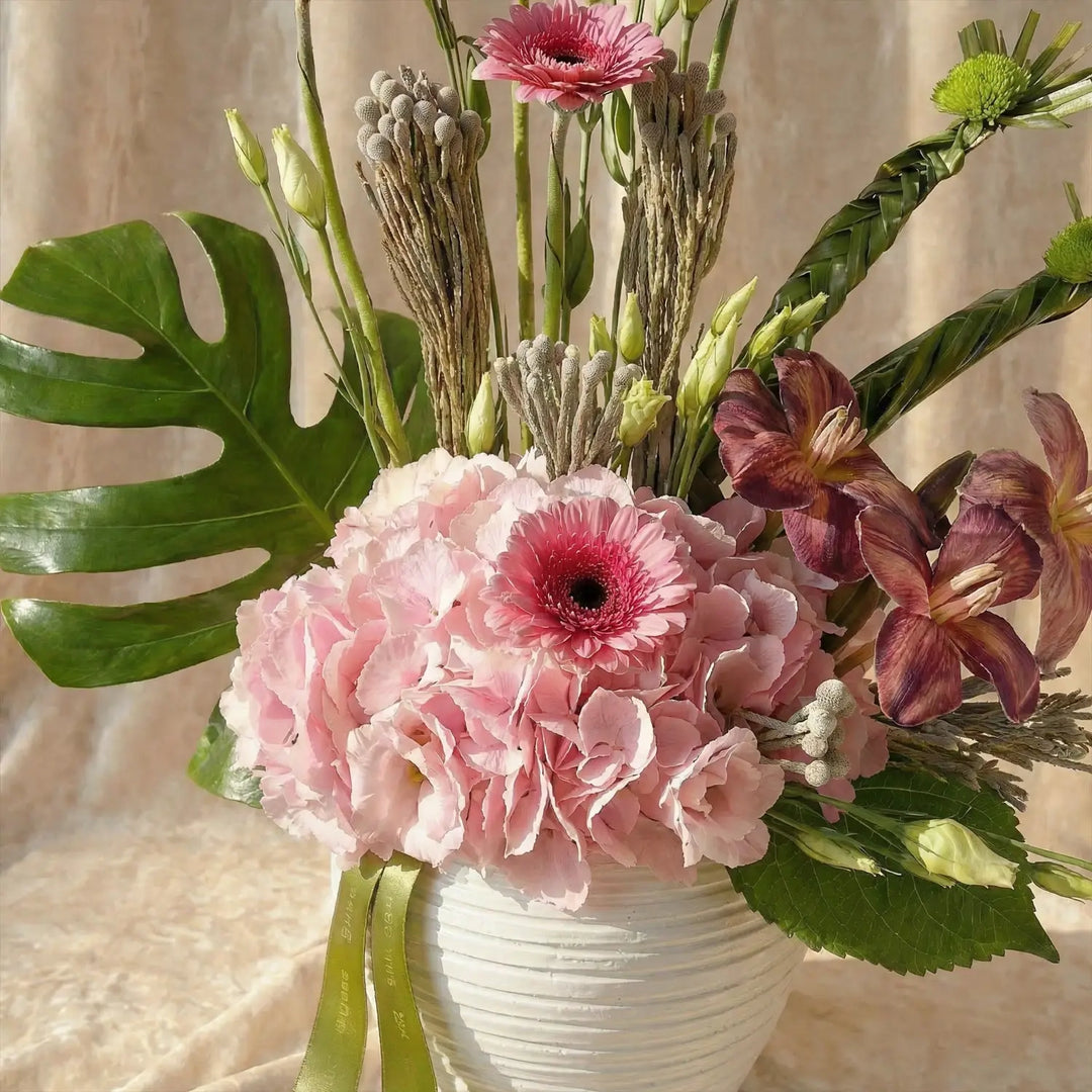 ترتيب زهور جنة وردية فاخرة